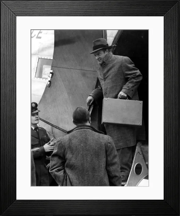 Framed Print : Bob Hope - American film star and comedian Bob Hope is pictured descending from an Framed Print : Bob Hope - American film star and comedian Bob Hope is pictured descending from an