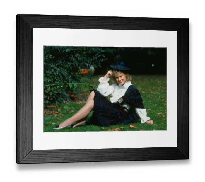 Framed Print : Elaine Smith actress sitting on grass wearing kilt and hat Framed Print : Elaine Smith actress sitting on grass wearing kilt and hat