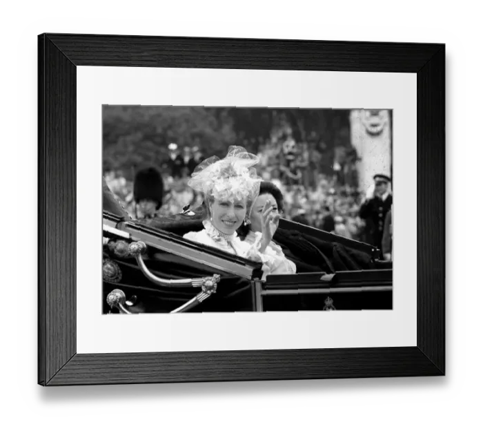Framed Print : Princess Anne and Princess Margaret waving from a carriage for the wedding of Prince