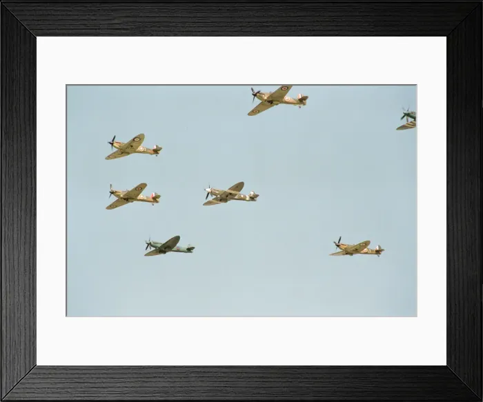 Framed Print : Spitfires and Hurricanes seen here during the flypast to commemorate the 50th Anniversary
