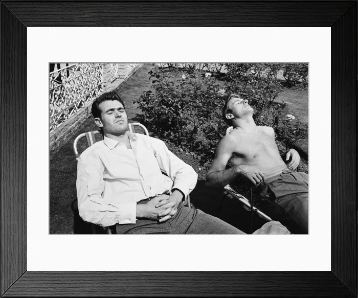 Framed Print : England football players John Connelly (left) and Roger Hunt sunbathing at their base in Framed Print : England football players John Connelly (left) and Roger Hunt sunbathing at their base in