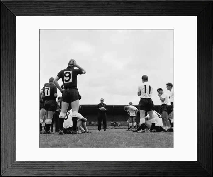 Framed Print : Tottenham Hotspur players listen to their manager Bill Nicholson during a training Framed Print : Tottenham Hotspur players listen to their manager Bill Nicholson during a training