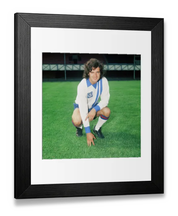Framed Print : Portsmouth player Norman Piper poses on the pitch at Fratton Park. August 1975