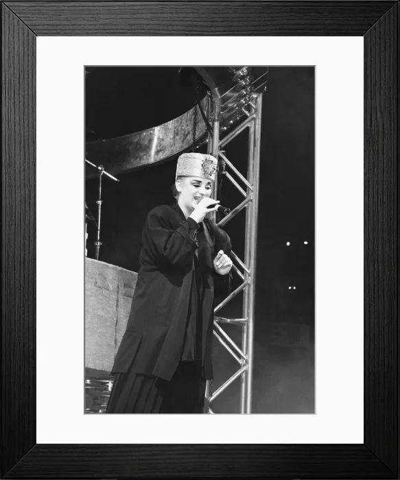 Framed Print : Lead singer with the band Culture Club, Boy George seen here with a Boy George Framed Print : Lead singer with the band Culture Club, Boy George seen here with a Boy George