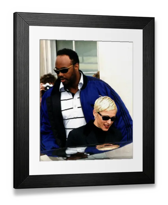 Framed Print : Madonna Singer Actress with burly minder leaving Lanesboruogh hotel