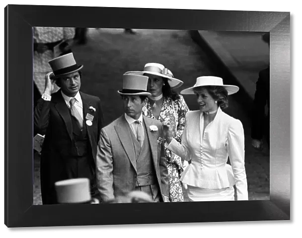 Prince Charles and Princess Diana with Oliver Hoare and his wife Diane behind at Royal