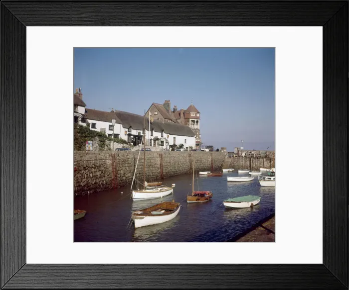 Framed Print : View of the town of Lynmouth on the North Devon coast, showing boats moored in Framed Print : View of the town of Lynmouth on the North Devon coast, showing boats moored in
