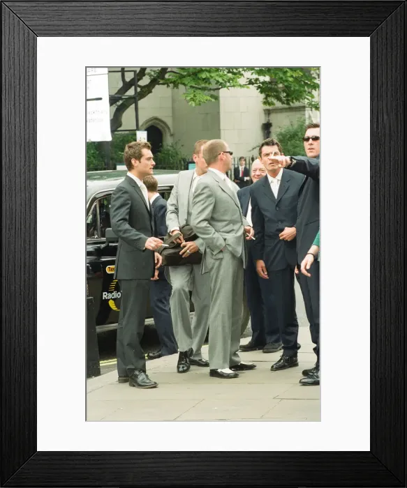 Framed Print : Sean Pertwee wedding. Guests arriving at the church. Jude Law Framed Print : Sean Pertwee wedding. Guests arriving at the church. Jude Law