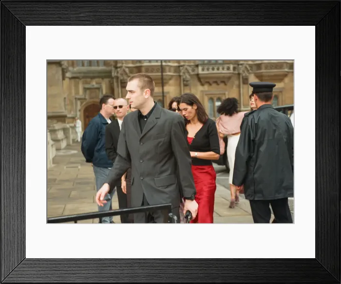 Framed Print : Sean Pertwee wedding. Guests arriving at the church Framed Print : Sean Pertwee wedding. Guests arriving at the church
