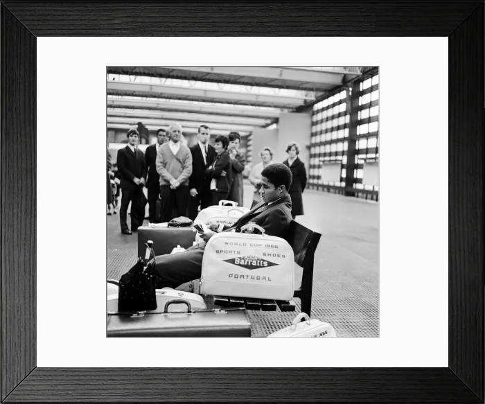 Framed Print : 1966 World Cup Tournament in England. Portugal star Eusebio surrounded by autograph Framed Print : 1966 World Cup Tournament in England. Portugal star Eusebio surrounded by autograph