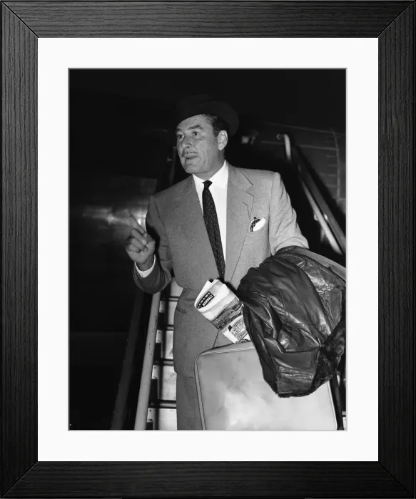 Framed Print : Hollywood star Errol Flynn seen here arriving at London Airport 17th November 1953 Framed Print : Hollywood star Errol Flynn seen here arriving at London Airport 17th November 1953