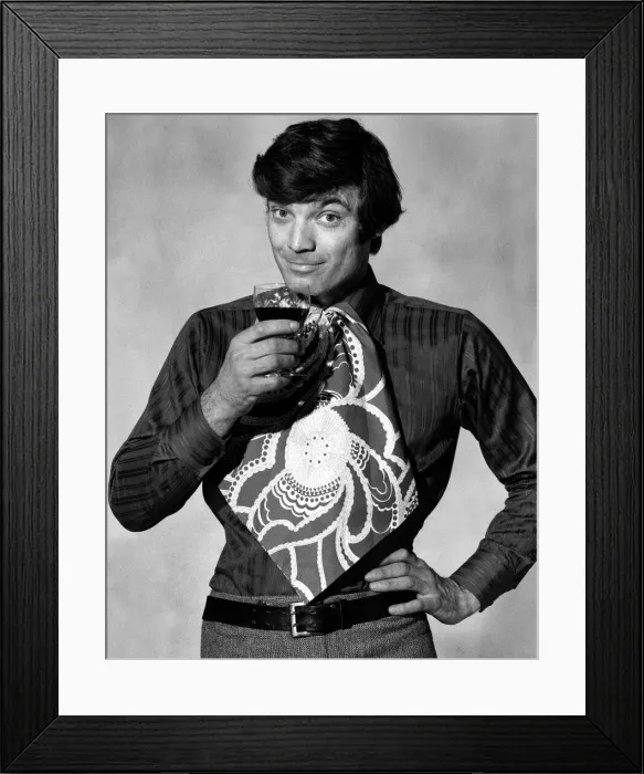 Framed Print : Mens Fashion Bib Tie Man modelling bib tie drinking a glass of wine