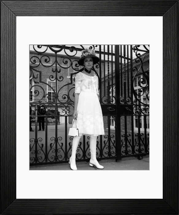 Framed Print : Fashion at Royal Ascot - June 1970 Ladies Day - A woman shows off her style of Framed Print : Fashion at Royal Ascot - June 1970 Ladies Day - A woman shows off her style of
