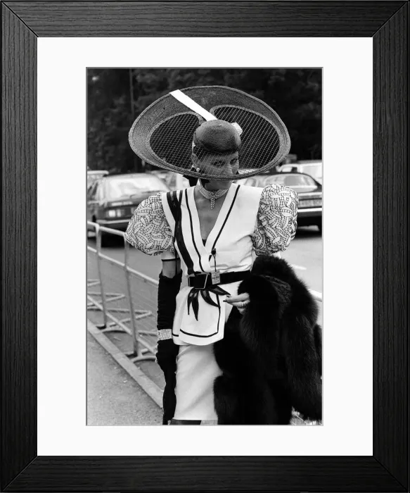 Framed Print : Fashion at Royal Ascot - June 1987 Ladies Day - A woman shows off her style of Framed Print : Fashion at Royal Ascot - June 1987 Ladies Day - A woman shows off her style of