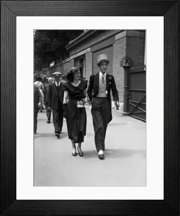Framed Print : Two racegoers walk down the street to the races. Ascot, June 1949 Framed Print : Two racegoers walk down the street to the races. Ascot, June 1949