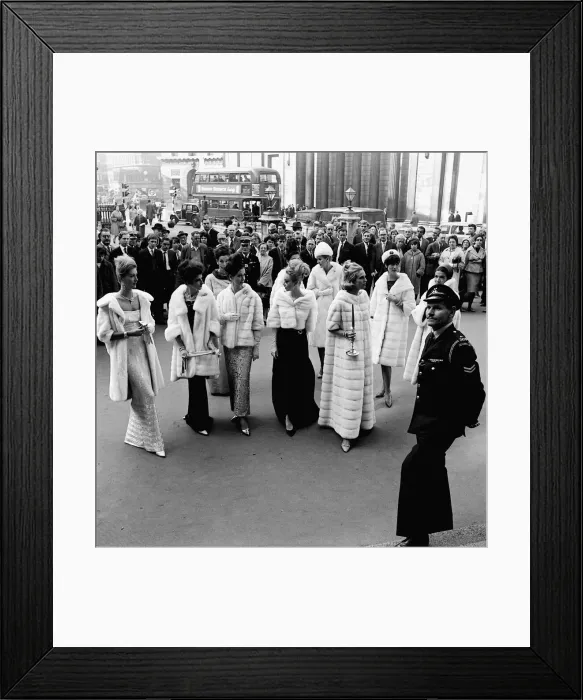 Framed Print : Minks Coats Fashion. Models at the Mansion House in London for a show call Mink Around