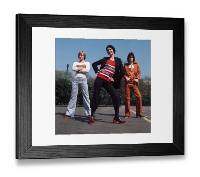 Framed Print : Glasgow fashion 1972 Two men and one woman wearing flared trousers, platform shoes Framed Print : Glasgow fashion 1972 Two men and one woman wearing flared trousers, platform shoes