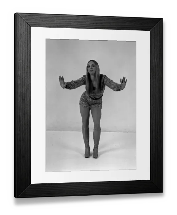 Framed Print : Flick from Pans People models Crepe de Chine shorts and shirt by Jeff Banks andd knee