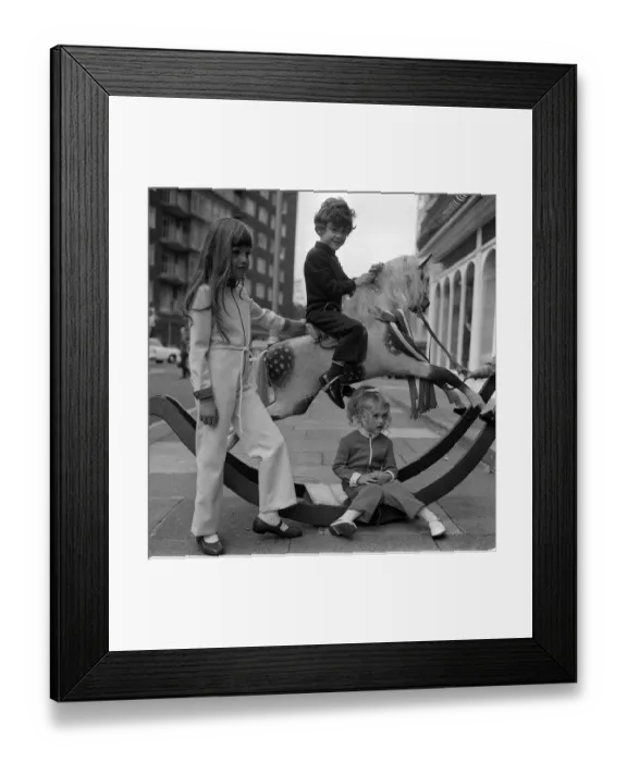 Framed Print : Fashion 1969 Children playing with a rocking horse in West Halkin Street selling Framed Print : Fashion 1969 Children playing with a rocking horse in West Halkin Street selling