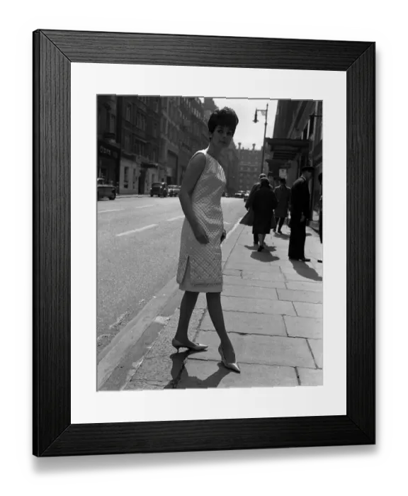 Framed Print : Sixties Fashion by Kiki Byrne Model wearing white dress with slits to the thigh Framed Print : Sixties Fashion by Kiki Byrne Model wearing white dress with slits to the thigh
