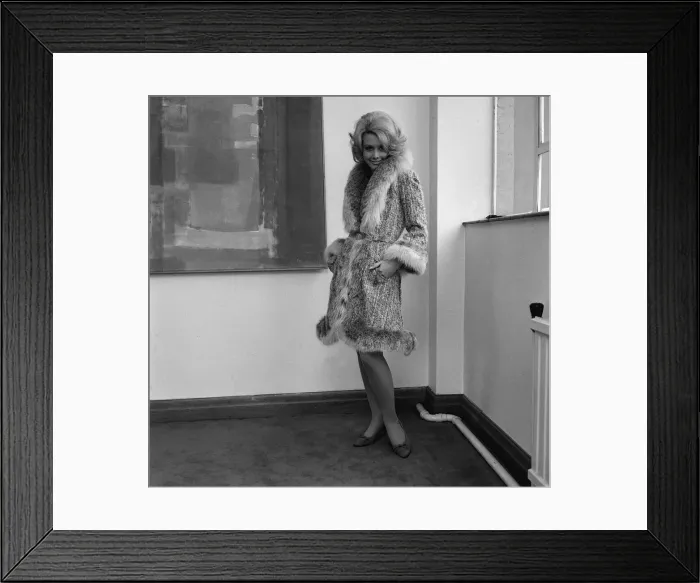 Framed Print : Graziella Fontana fashion June 1965 Model standing in the corner of a room wearing Framed Print : Graziella Fontana fashion June 1965 Model standing in the corner of a room wearing