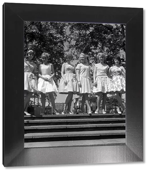 Ya Ya Girls fashion Six girls  /  female models standing outside on some concrete