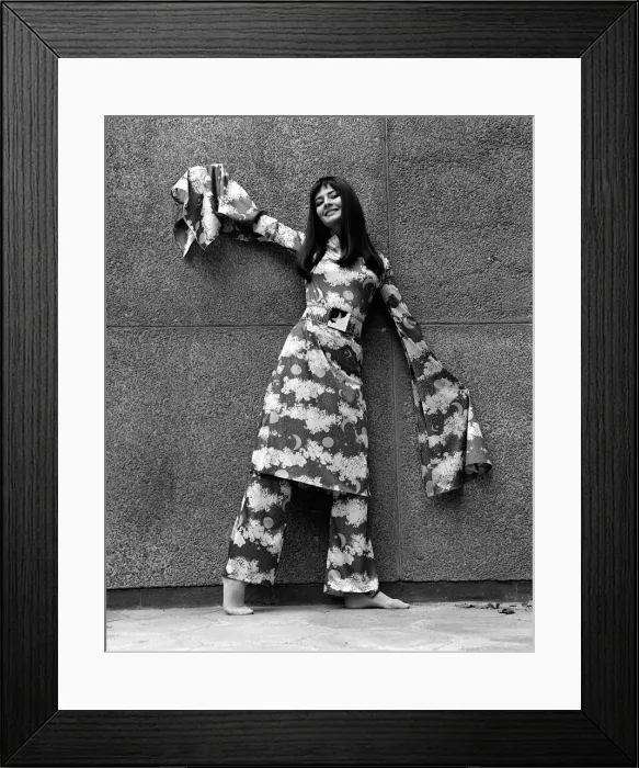 Framed Print : Christine Brooke in Simon Massey element print trouser outfit with outsize sleeves Framed Print : Christine Brooke in Simon Massey element print trouser outfit with outsize sleeves