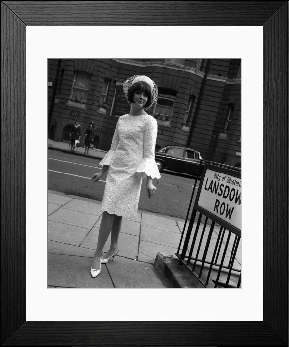 Framed Print : Sixties Fashion by Kiki Byrne Model wearinf white dress with wide sleeves Framed Print : Sixties Fashion by Kiki Byrne Model wearinf white dress with wide sleeves