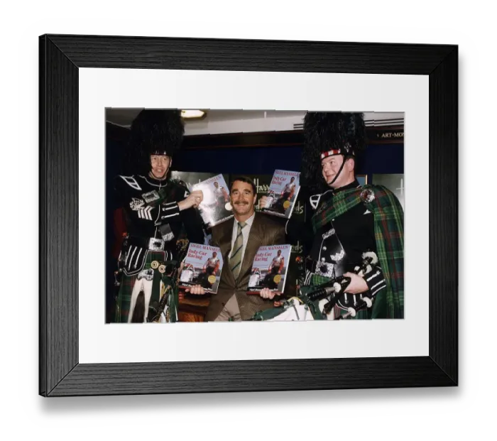 Framed Print : Nigel Mansell Motor Racing Driver Formula One F1 at Harrods for the signing of his book