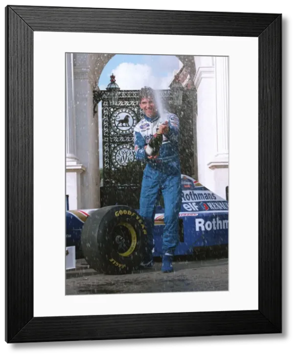Framed Print : Damon Hill Motor Racing Formula One champion celebrates at Marble Arch with champagne Framed Print : Damon Hill Motor Racing Formula One champion celebrates at Marble Arch with champagne