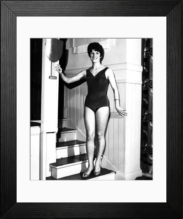 Framed Print : Dorothy Hyman, olympics finalist, modelling a bathing suit in March 1967 Framed Print : Dorothy Hyman, olympics finalist, modelling a bathing suit in March 1967