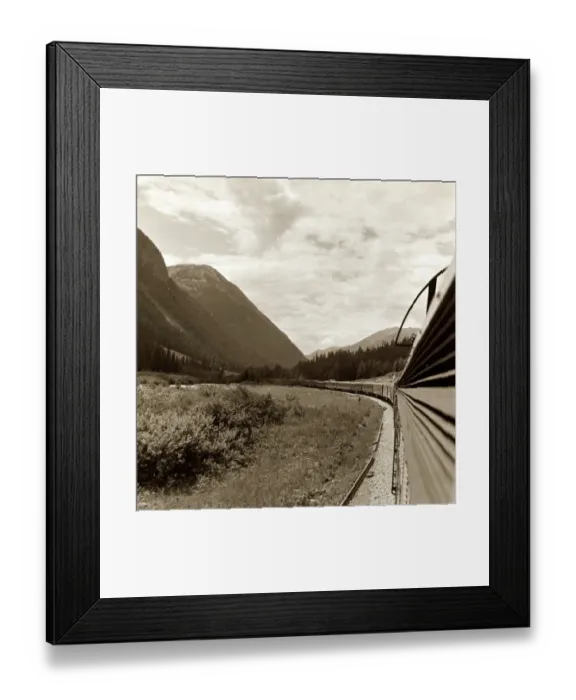 Framed Print : A train goes through the Rocky Mountains from Vancouver to Banff. Canada Framed Print : A train goes through the Rocky Mountains from Vancouver to Banff. Canada