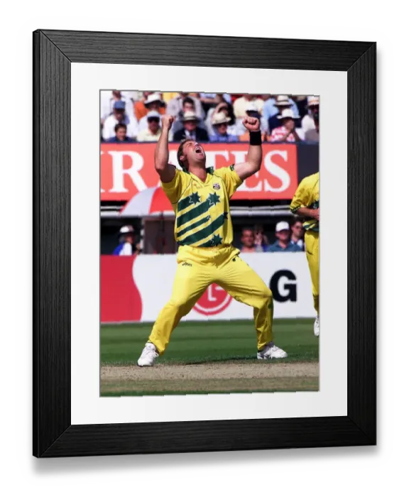 Framed Print : Shane Warne of Australia celebrates after taking a wicket against South Africa in Framed Print : Shane Warne of Australia celebrates after taking a wicket against South Africa in