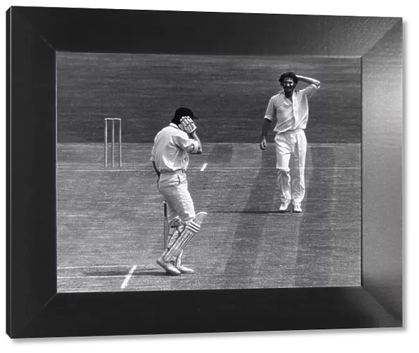 Ted Dexter batsman receives ball from Australian fast bowler Dennis Lillee