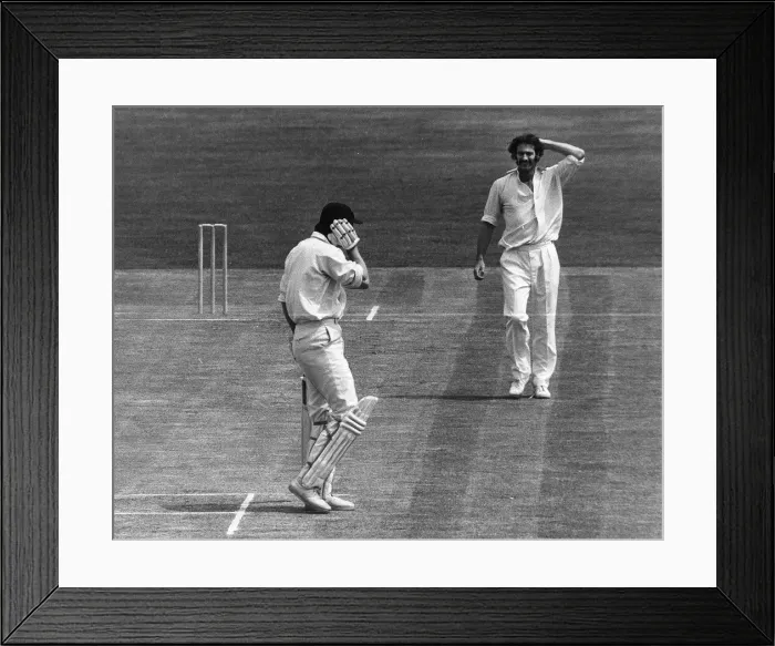 Framed Print : Ted Dexter batsman receives ball from Australian fast bowler Dennis Lillee Framed Print : Ted Dexter batsman receives ball from Australian fast bowler Dennis Lillee