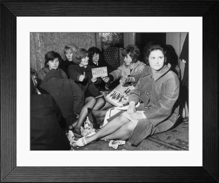 Framed Print : Teenagers queue in queued in the rain at the Majestic ballroom in Birkenhead from 5am for Framed Print : Teenagers queue in queued in the rain at the Majestic ballroom in Birkenhead from 5am for