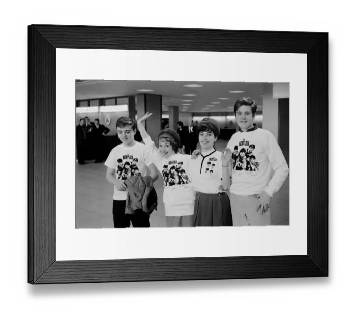 Framed Print : American fans wearing Beatles t shirts await the arrival of their heroes at New York Framed Print : American fans wearing Beatles t shirts await the arrival of their heroes at New York