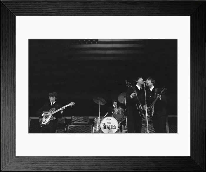 Framed Print : The Beatles onstage before the stars and stripes on the second night of their US tour Framed Print : The Beatles onstage before the stars and stripes on the second night of their US tour