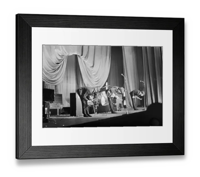 Framed Print : The Beatles take a bow on stage in Carlisle at the end of their concert