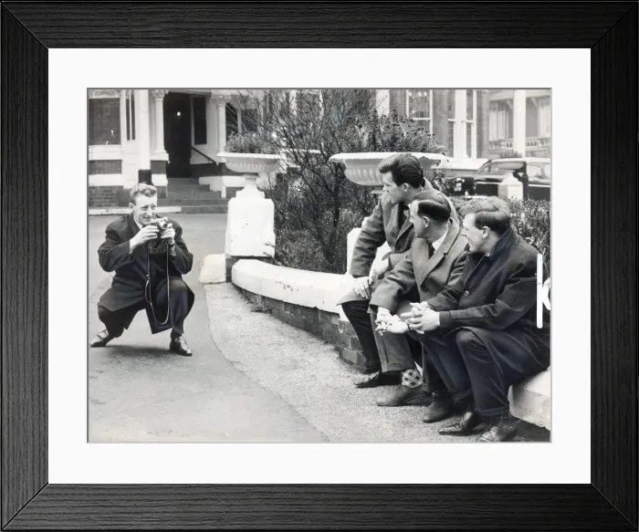 Framed Print : Tommy Gemmell gets three of his team mates in focus outside their southport hotel where Framed Print : Tommy Gemmell gets three of his team mates in focus outside their southport hotel where