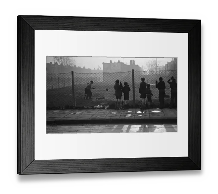 Framed Print : Life in the Mirror Our Gang. 19th January 1954 Boys playing football watched on by