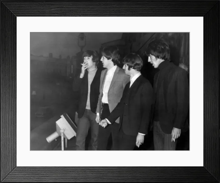Framed Print : The Beatles enjoy a cigarette break on the balcony of the Empire Theatre in Liverpool 8th Framed Print : The Beatles enjoy a cigarette break on the balcony of the Empire Theatre in Liverpool 8th