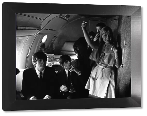The Beatles on Pan Am Flight 101 from London Heathrow Airport to New York for a 10 day