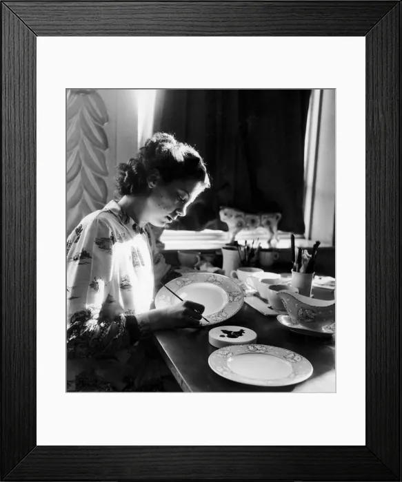 Framed Print : Olwyn Cotgreave, aged 20, tracing in platinum the outline of the flower design on a Framed Print : Olwyn Cotgreave, aged 20, tracing in platinum the outline of the flower design on a