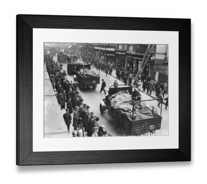 Framed Print : Soldiers ride shotgun as a food convoy passes through central London