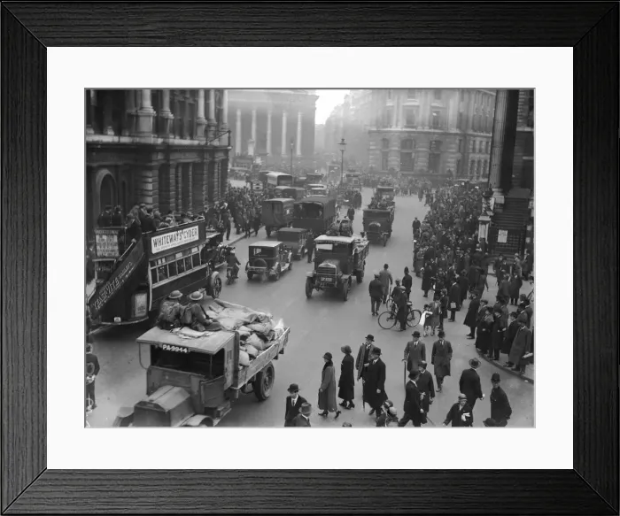 Framed Print : The army escort a food convoy past commuters making their way to work near The Bank in