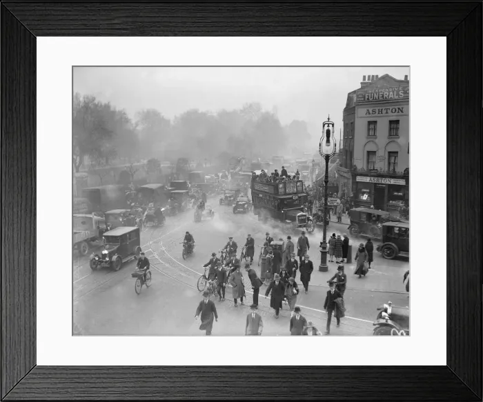 Framed Print : Commuters crowd onto buses and make shift public transport to get home from work