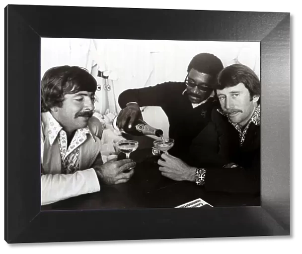 Rod Marsh, Australian Cricketer having a glass of Champagne with Clive Lloyd