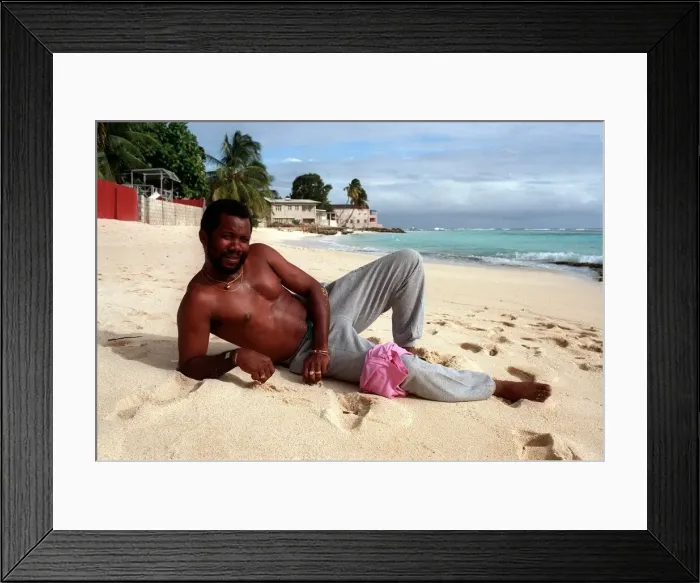 Framed Print : Malcolm Marshall West Indies cricketer relaxes on a sandy beach in Barbados 5th February