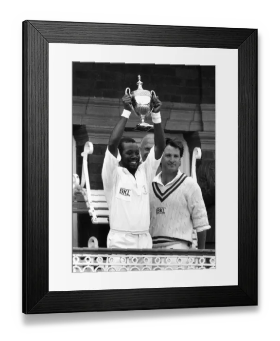 Framed Print : Malcolm Marshall cricketer holding the Benson Hedges Trophy after Hampshire beat Kent by